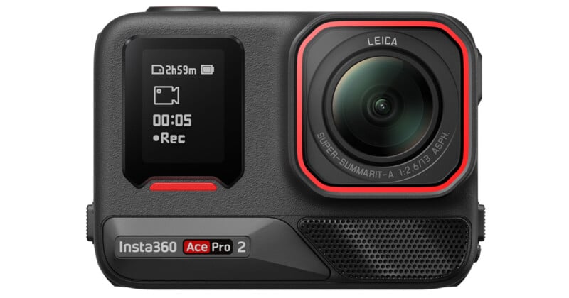 A compact action camera with a prominent lens and a small display screen showing battery and recording information. The camera features branding from Insta360 and Leica.