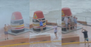 A split image shows people posing near the Southernmost Point Buoy in Key West, Florida, as waves crash over the seawall. The buoy is black, red, and yellow with white text indicating the southernmost point of the continental U.S.