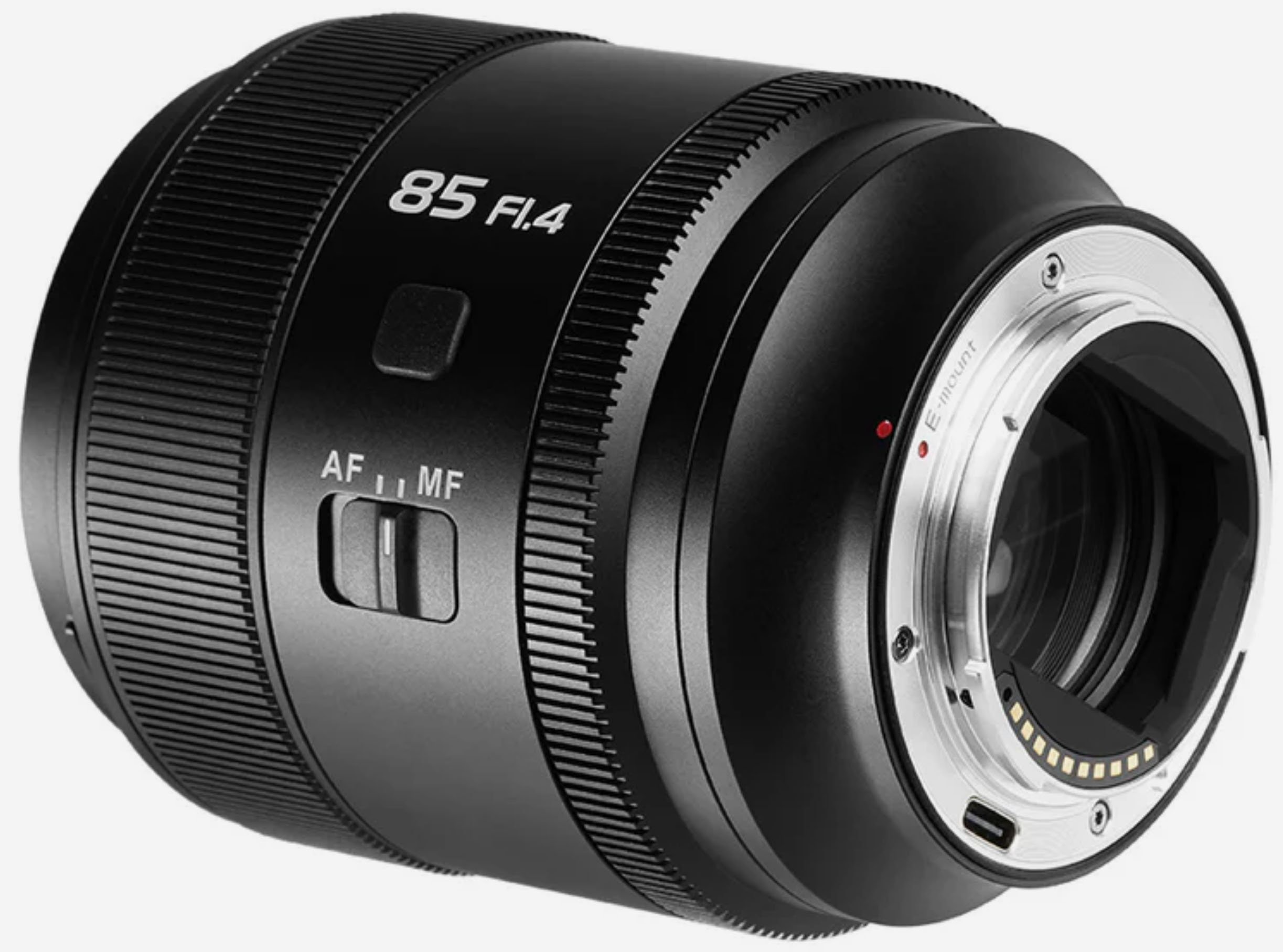 A black camera lens labeled "85 F1.4" is shown. The lens has a ribbed focus ring and a selector switch for AF/MF (autofocus/manual focus). The rear of the lens, with electronic contacts, is visible.