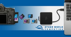 A camera with memory cards connected to a hub, transferring data to a laptop. The image features the OWC logo and the text "Other World Computing" on a blue and white background.