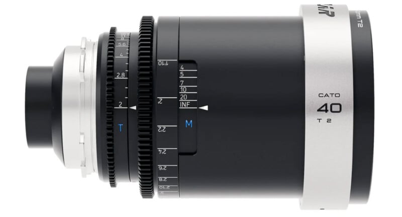 A close-up view of a camera lens showing various adjustment dials and numbers. The lens is labeled "Cato 40 T2" and has a sleek black and silver design.