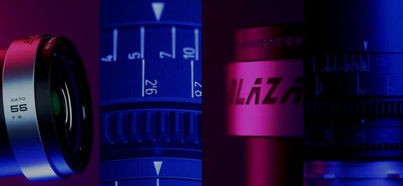 Close-up of four camera lenses with different lighting. Each lens is illuminated in shades of blue and magenta. The first lens shows the number 55, and another lens has the word "LAZA" partially visible. Each has intricate detailing and markings.