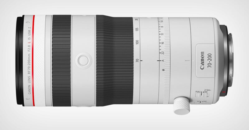 A white Canon RF 70-200mm f/2.8 L IS USM telephoto lens with zoom and focus rings, a white tripod collar, and a silver mount, set against a light gray background.