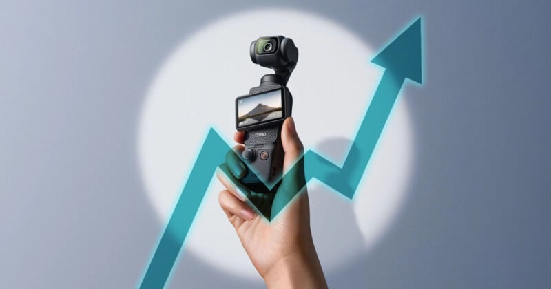 A hand holds a compact camera with a built-in screen, capturing an upward trend symbolized by a teal arrow. The background is a gradient of a spotlight effect, emphasizing growth and innovation.