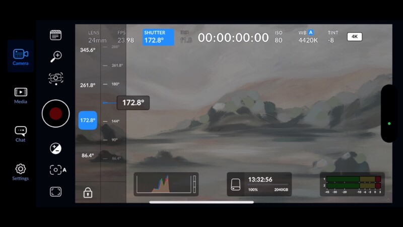 A digital interface for a camera app displays settings such as lens, FPS and ISO with a blurred landscape in the background. The screen shows a shutter speed of 172.8°, a white balance of 4420K and a shooting time of 1:32:56, with 20GB of storage remaining.