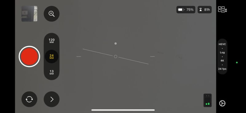 A smartphone screen displays a camera interface with various controls. The battery is at 75%, and the settings show HEVC format, Log color, and 24 fps. A central circle and line are visible against a neutral background.