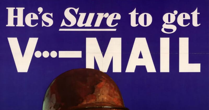 A vintage poster with the text "He's Sure to get V---MAIL" in bold letters on a blue background. A brown helmet is partially visible at the bottom.