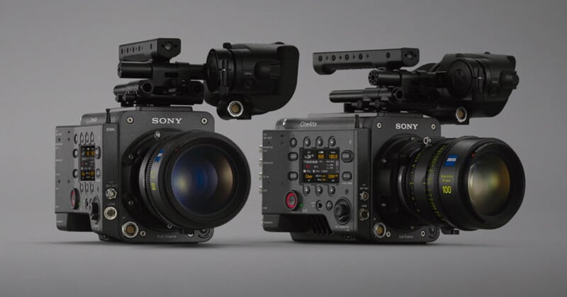 Two professional Sony video cameras with large lenses and various control buttons and dials are positioned side by side against a plain background. The cameras are equipped with accessories for advanced filming.