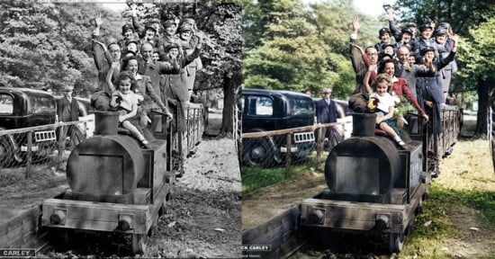 Black-and-white and colorized versions of a historical photo showing a group of people, including children, excitedly riding a small steam train outdoors. Trees and classic cars are visible in the background.