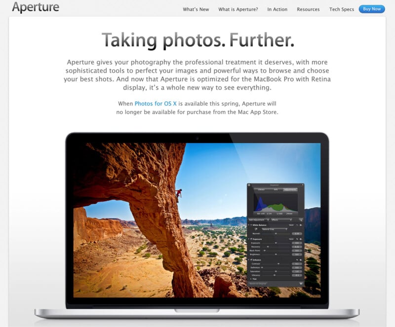 A laptop displaying a landscape image with editing software overlaid. The background shows a desert scene with a rock arch and blue sky. The text above reads, "Taking photos. Further." A note mentions availability changes for Photos for OS X.