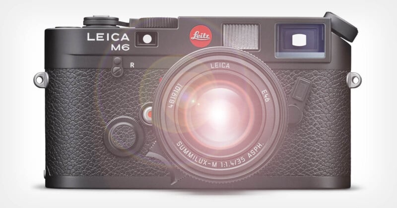 A Leica M6 camera with a classic black design is shown from the front. The camera has textured grips, a lens attached, and a red Leica logo above the lens, with a bright glare effect over the lens.