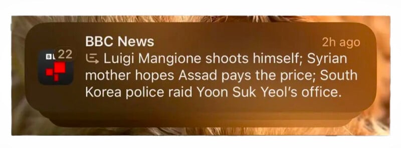 Notification from BBC News mentioning Luigi Mangione shooting himself, a Syrian mother's hopes that Assad will pay the price, and South Korean police raiding Yoon Suk Yeol's office.