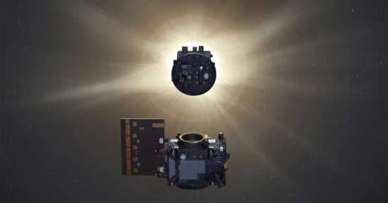 Illustration of a spacecraft with solar panels in space, positioned against the backdrop of a glowing sun. The sun's corona is visible, creating a halo effect around the central black circle, which depicts the sun's obscured surface.
