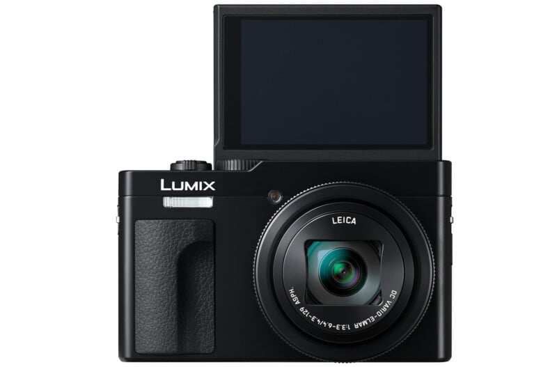 A black digital camera with a face-up window and a Leica lens. The screen is extended upwards, and the camera is labeled with "Lumix.