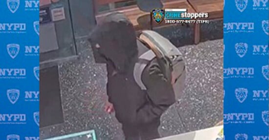 Person wearing a dark hoodie and backpack walking inside a building. Background features NYPD Crime Stoppers logos and contact information.