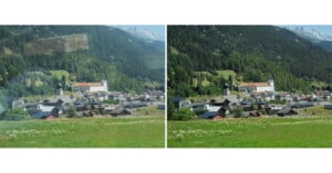 A picturesque village set against a lush green mountain backdrop. Two versions of the same scene show a cluster of houses and a prominent church surrounded by meadows and a forest under a clear blue sky.