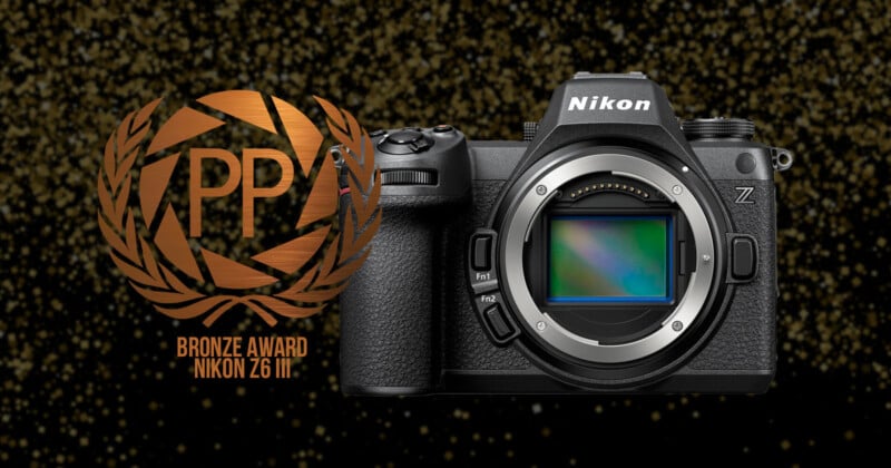 A Nikon Z6 camera is displayed against a glittering background. To its left, a bronze award emblem features the text "PP Bronze Award Nikon Z6III".