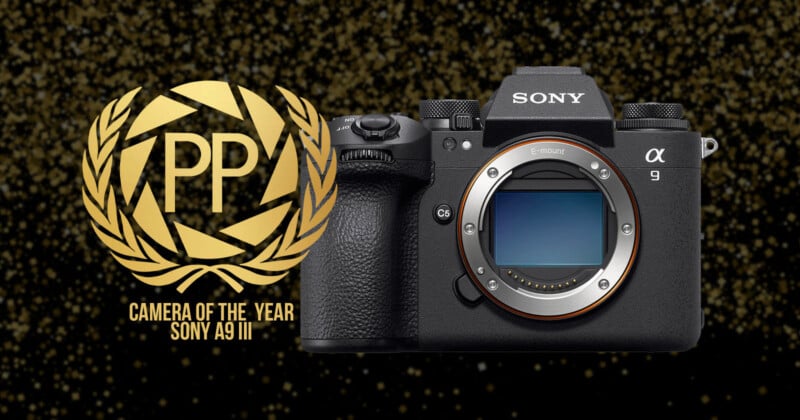 A Sony 85mm f/1.4 GM II lens on a black background with a gold laurel wreath. Text reads “Prime Lens of the Year” in gold letters.