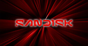 A digital graphic featuring the word "SanDisk" in bold, futuristic white letters with a red and black rays background emanating from the center, creating a dynamic and energetic effect.