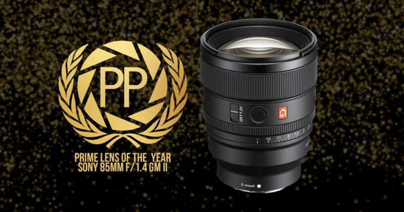 A Sony 85mm f/1.4 GM II lens is displayed against a dark background. To the left, there's a gold emblem with "PP" and the text "Prime Lens of the Year Sony 85mm f/1.4 GM II" beneath it.