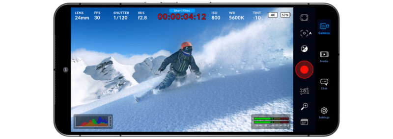 A smartphone screen displays a video recording interface with a snowboarder on a snowy slope. The screen shows camera settings like lens size, shutter speed, ISO, and more. Side icons include camera, media, and chat options.