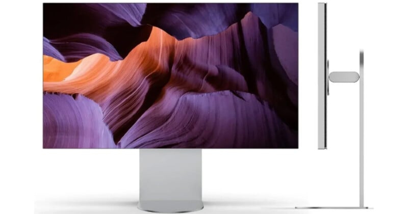 A sleek, modern computer monitor with a curved base and a side profile stand. The screen displays a vibrant abstract design featuring swirling shades of purple and orange.