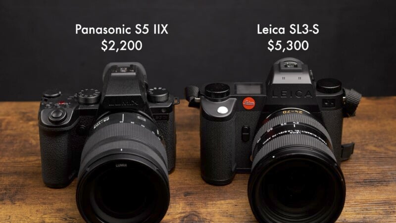 Two cameras on a wooden surface against a dark background. On the left is the Panasonic S5 IIX with a price tag of $2,200. On the right is the Leica SL3-S priced at $5,300.