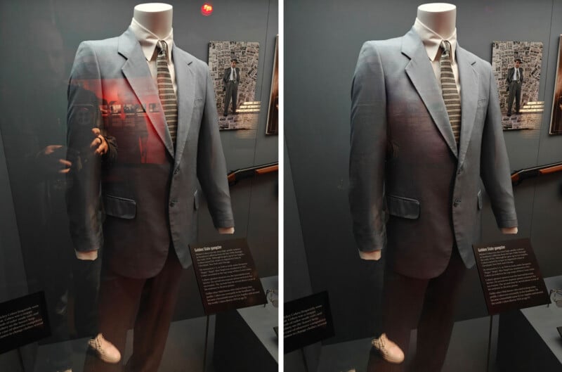 A gray suit and tie displayed in a glass case. The left image shows reflections of a person taking the photo and background elements, while the right image is clearer with less reflection. Information plaques are visible below the suit.