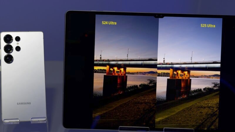 A Samsung smartphone is displayed next to a large screen showing a side-by-side comparison of two photographs labeled "S24 Ultra" and "S25 Ultra," illustrating differences in photo quality.