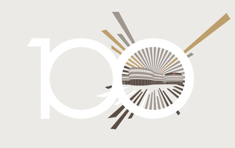 Graphic design features the number 100, with stylized buildings and radiating lines forming the zeros. Neutral tones of white, brown, gray, and beige are used throughout the design.