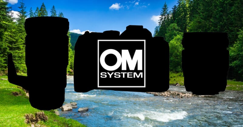 Silhouettes of camera equipment, including a camera body and two lenses, against a scenic backdrop of a river flowing through a lush, green forest under a blue sky. The text "OM SYSTEM" is visible on the central silhouette.