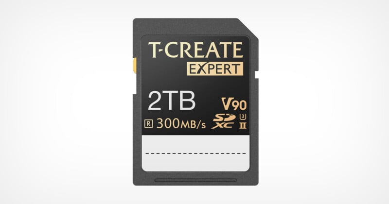 Image shows a T-CREATE Expert 2TB SD card, labeled with V90, R 300MB/s, UHS-II, and SDXC logos. The card is black with gold and white accents, indicating high-speed data transfer and capacity suitable for professional use.