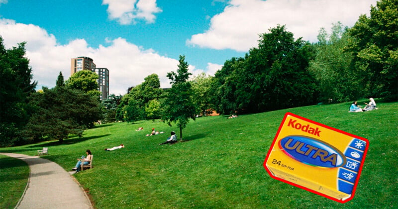 A lush green park with people relaxing on the grass and a path on the left. A Kodak Ultra 400 film box is superimposed prominently on the right. Trees and a tall building are in the background under a blue sky with clouds.