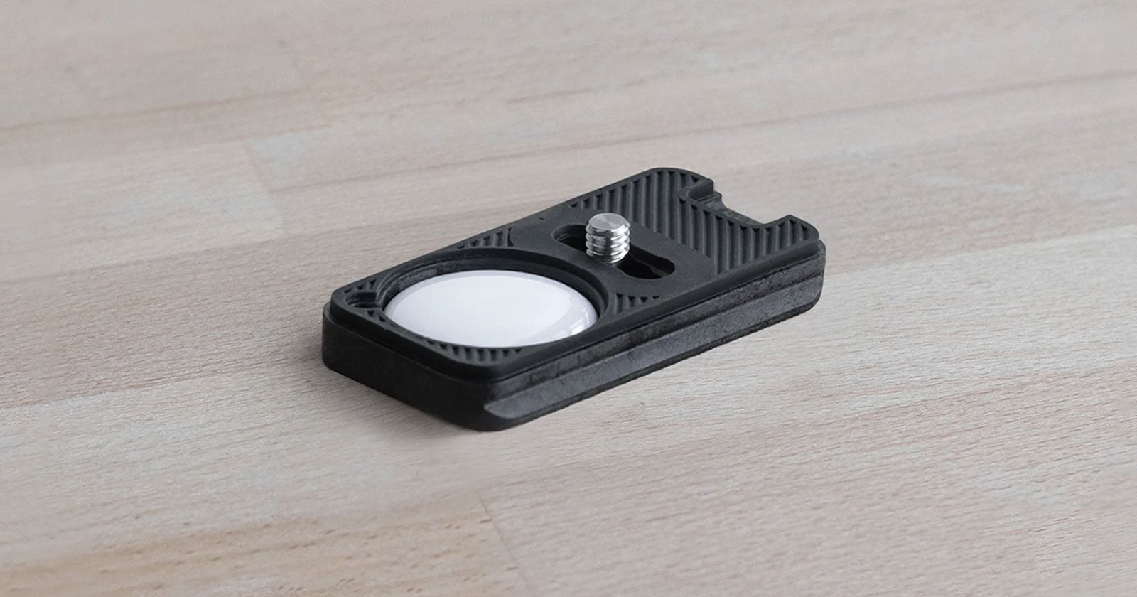 This Arca-Swiss Tripod Plate Hides an AirTag On Your Camera | PetaPixel