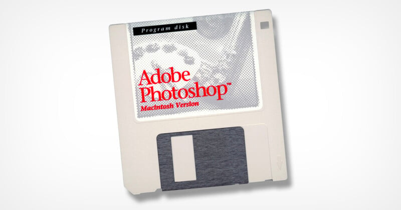 A vintage Adobe Photoshop floppy disk for the Macintosh, featuring a gray and white label with "Adobe Photoshop" and "Macintosh Version" written in red and black text. The disk shows a partial image of a grayscale photo on the label.