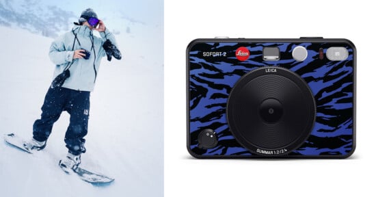 A person snowboards on a snowy slope wearing a light jacket and dark pants, holding a camera. Next to this, a close-up of a Leica Sofort 2 camera with a black and blue tiger stripe design is displayed.