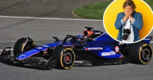 A blue Formula 1 car on a racetrack with visible sponsor logos. Inset: a person with long hair, wearing a yellow shirt, covers their face with their hands. They have a camera hanging around their neck.