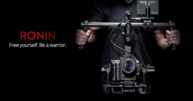 A person holds a camera stabilizer with a camera attached, set against a dark background. Text on the left reads: "RONIN - Free yourself. Be a warrior.