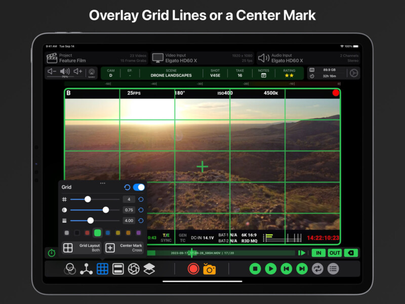 A tablet displaying a video editing application. The screen shows a landscape video with overlay grid lines and a center mark. Various control settings and options are also visible around the video frame.