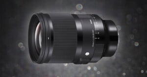 A close-up of a Sigma 35mm f/1.2 Art lens on a dark, bokeh background. The lens has a sleek black design with a ribbed focus ring and visible aperture markings.