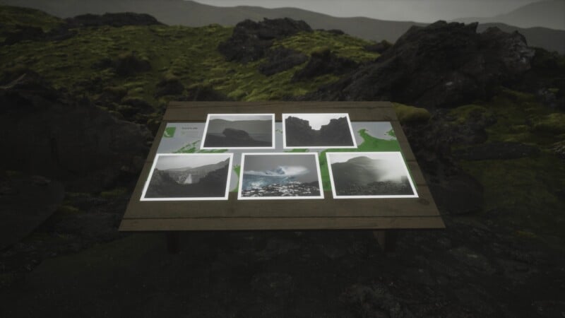A wooden table on a mossy landscape displays several scenic photos featuring cliffs, mountains, and misty landscapes against a backdrop of dark, rocky terrain.