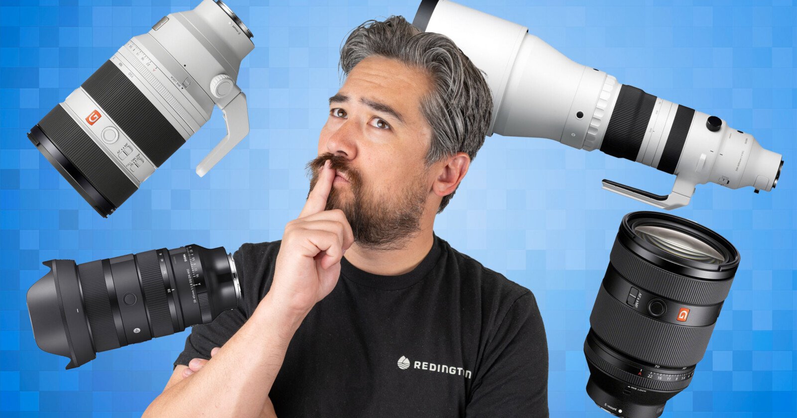 A man with gray hair and beard, wearing a black shirt, stands thoughtfully with his finger on his lips. Four large camera lenses float around him against a blue pixelated background.