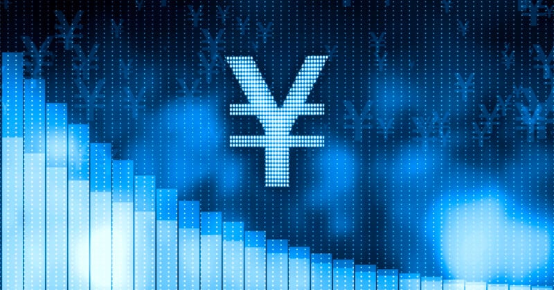 Digital illustration of a yen currency symbol at the center, with glowing blue pixelated background and descending bar graph elements on the left side, representing financial or economic data.