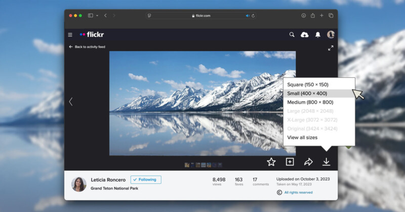 A computer screen displays a Flickr photo of snow-capped mountains reflected in a lake, with a menu open showing image size options like small, medium, and original.