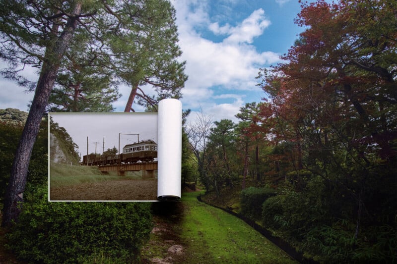 A large photo print of a city scene with a tram is partially unrolled over a lush, green park filled with trees, blending urban and natural landscapes under a partly cloudy sky.