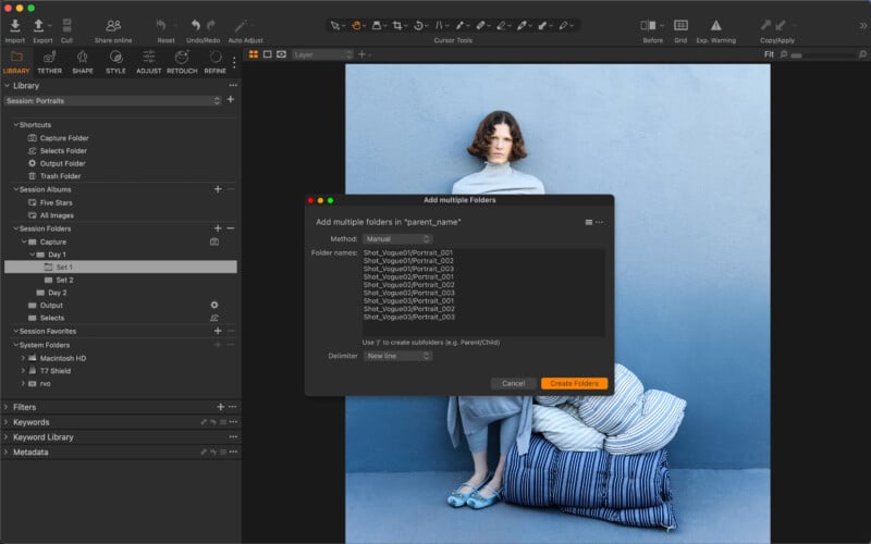 A photo editing software window shows a woman in a light blue dress posing against a blue wall, standing beside striped pillows. A pop-up for adding multiple folders is open in the center of the screen.
