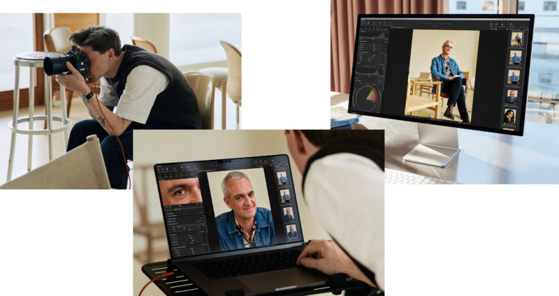 A photographer takes photos of an older man sitting in a chair, then edits the portraits on a desktop and a laptop, displaying close-ups and editing software on the screens.