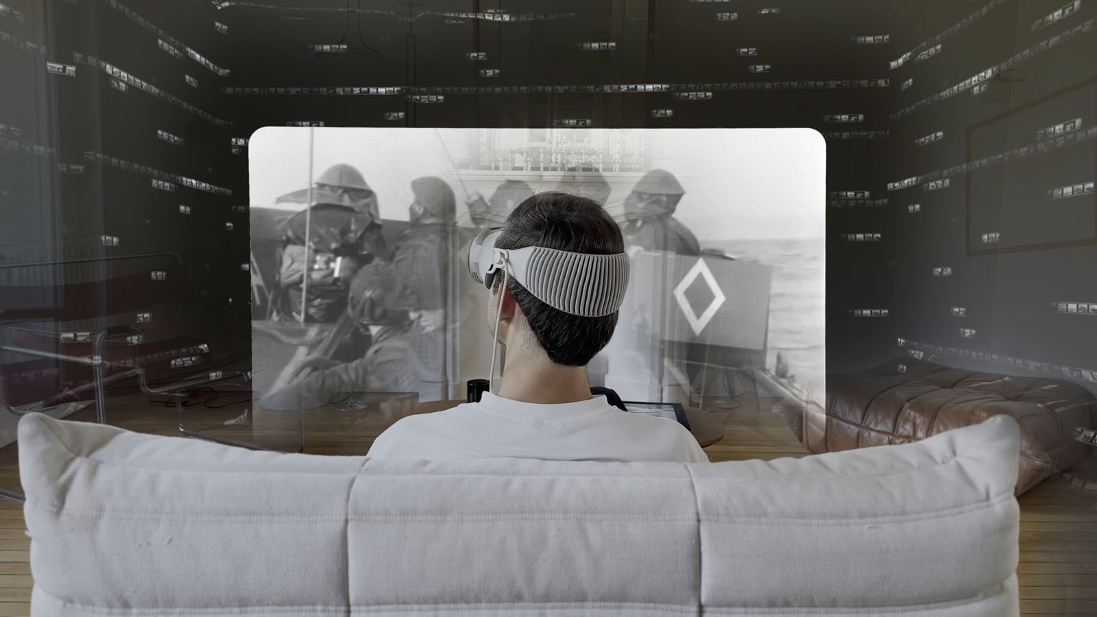 A person wearing a futuristic headset sits on a white couch, facing a large translucent screen displaying a black-and-white war film in a modern, dimly lit room.