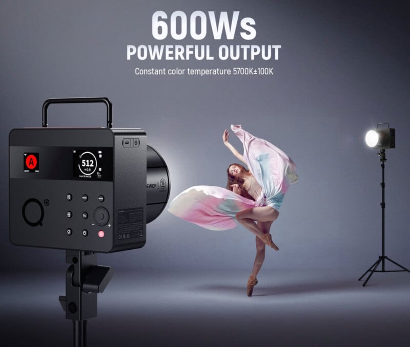 A powerful studio light is set up in front of a dancer wearing flowing fabric, with another light positioned behind her. Text above reads, "600Ws POWERFUL OUTPUT Constant color temperature 5700K±100K.