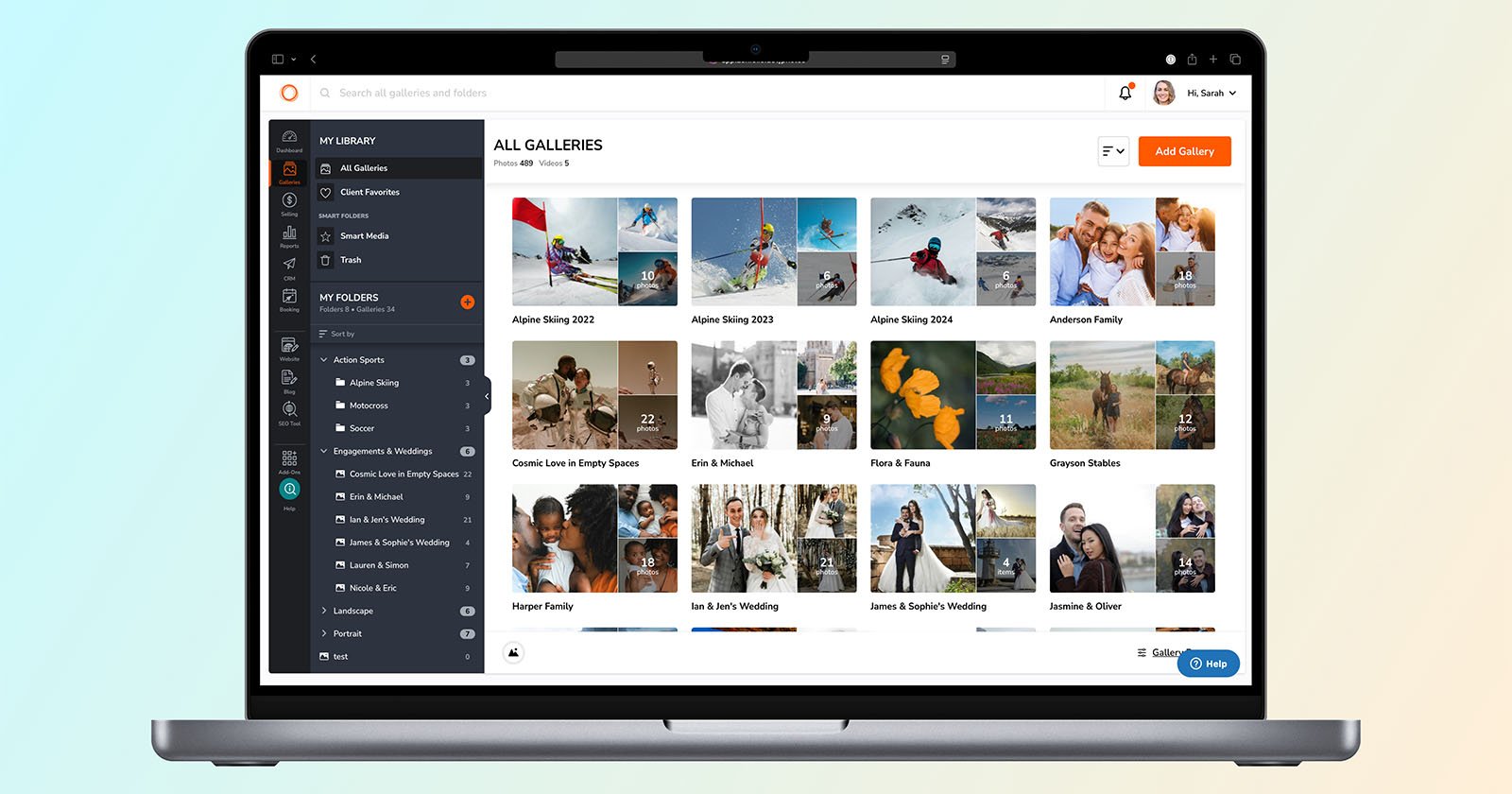 A laptop displays a photo gallery management interface with album thumbnails, navigation menus on the left, and options to add a new gallery or search, all against a light background.